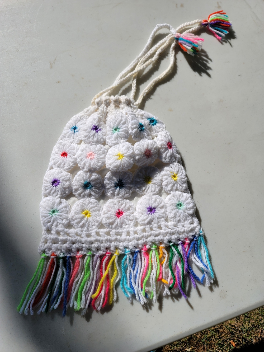 White Crochet Drawstring Bag with Rainbow Accents
